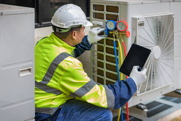 Professional Air Conditioning Repair technician working in Lewistown, OH